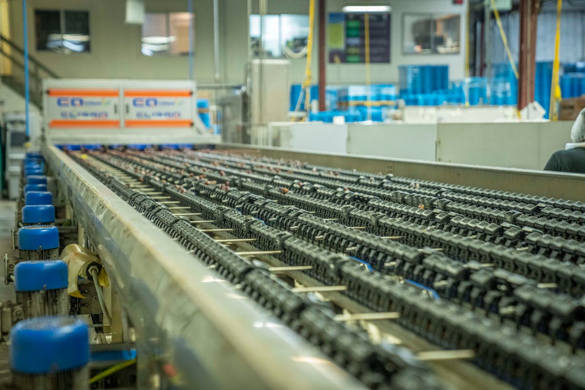 Automated production pipeline representing continuous delivery for connected products