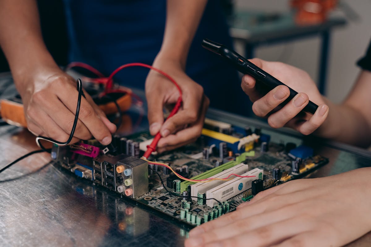 Circuit board connected to test probes on an engineering workbench